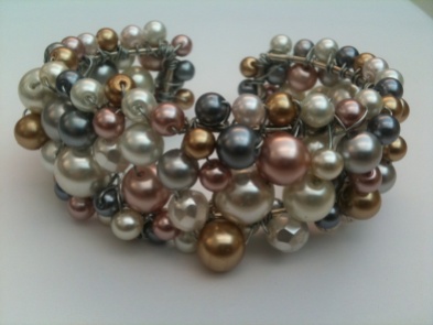 A sculpture of wire and glass pearls became one of my signature bracelets.