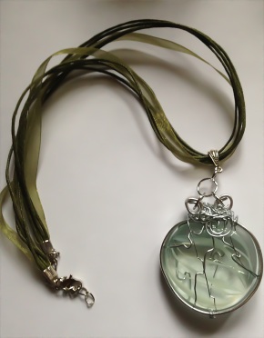 Rutliated glass with thick silver frame necklace